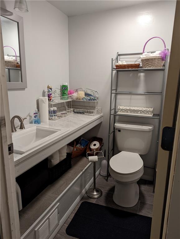 71 Blanche Road Fredericktown, PA 15333 - Photo 16 of 19 a bathroom with a sink toilet and a mirror