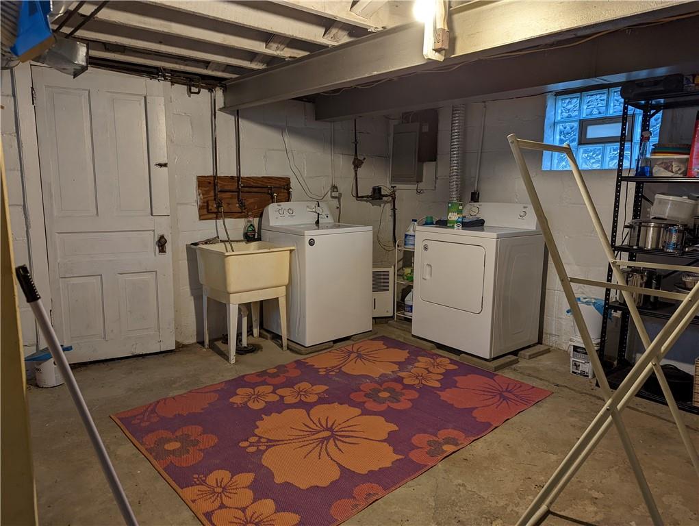 71 Blanche Road Fredericktown, PA 15333 - Photo 19 of 19 a room with furniture a washer and dryer