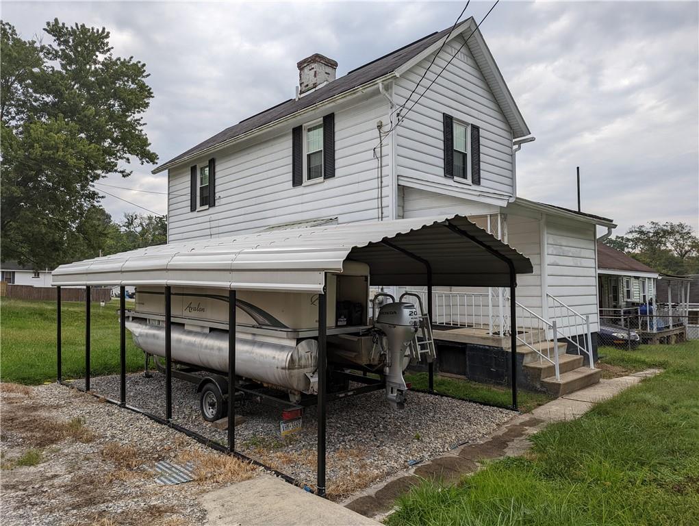 71 Blanche Road Fredericktown, PA 15333 - Photo 3 of 19 a view of a house with a yard chairs and a table