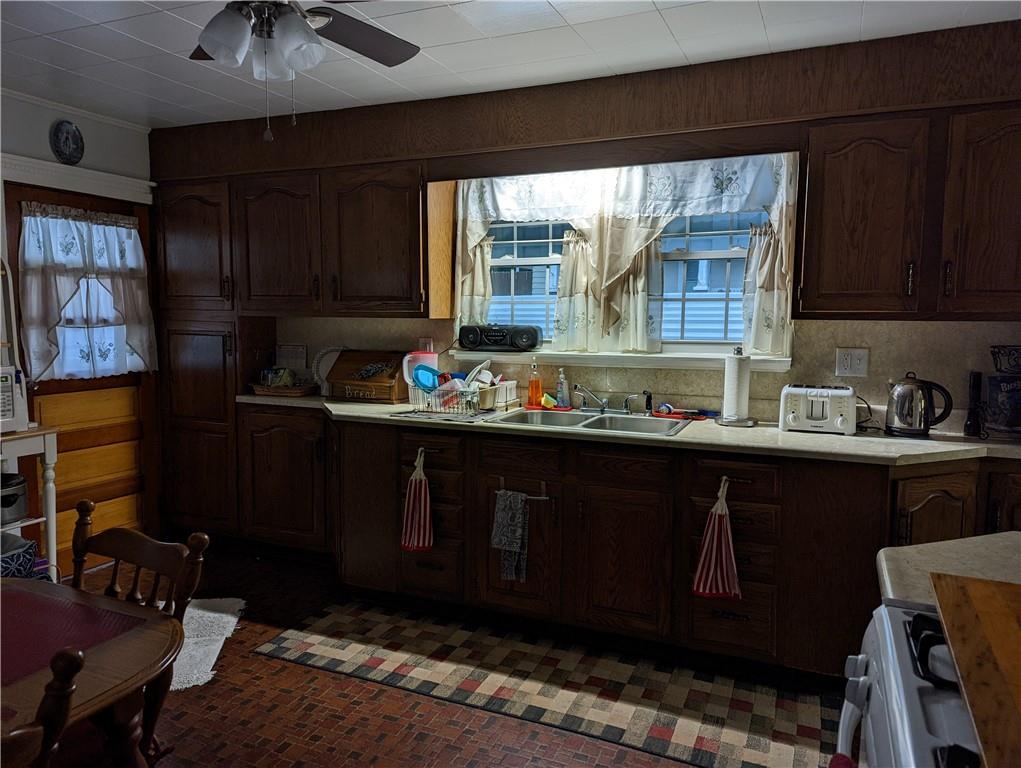 71 Blanche Road Fredericktown, PA 15333 - Photo 10 of 19 a kitchen with sink and wooden cabinets