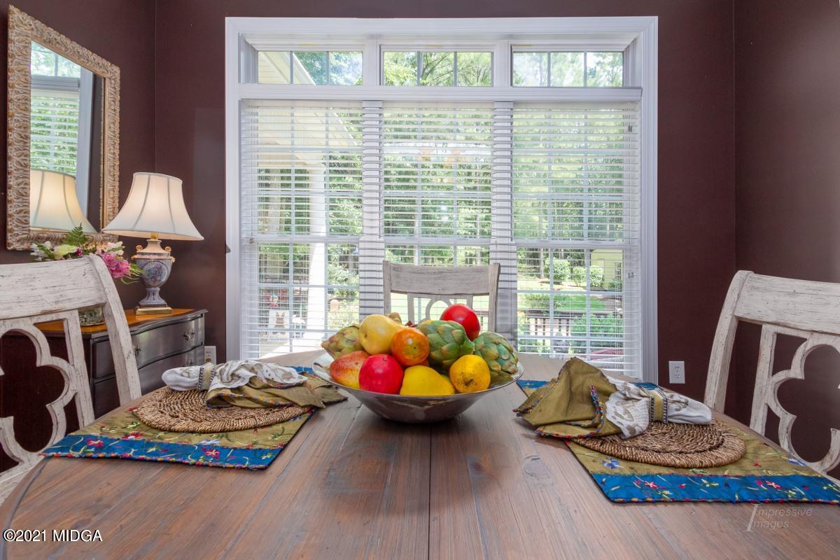 7109 Colaparchee Road Macon, GA 31220 - Photo 15 of 34 a room with furniture and a large window