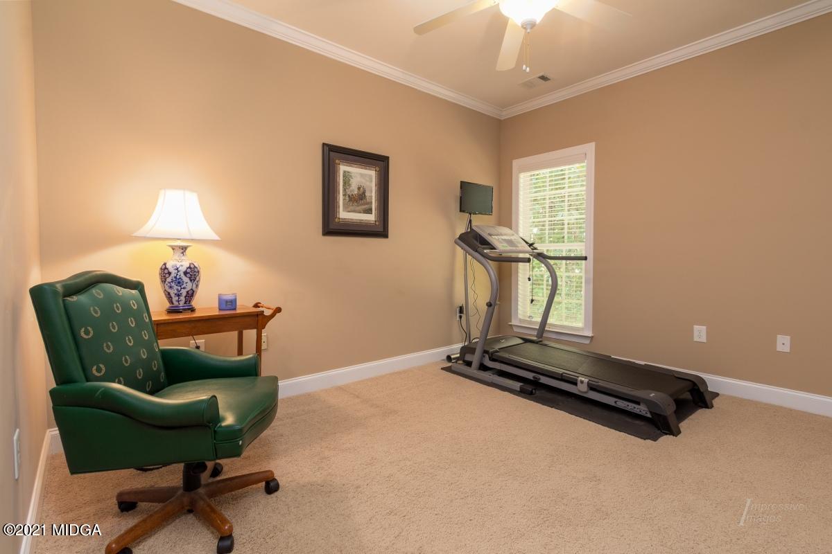 7109 Colaparchee Road Macon, GA 31220 - Photo 26 of 34 a room with furniture and a window