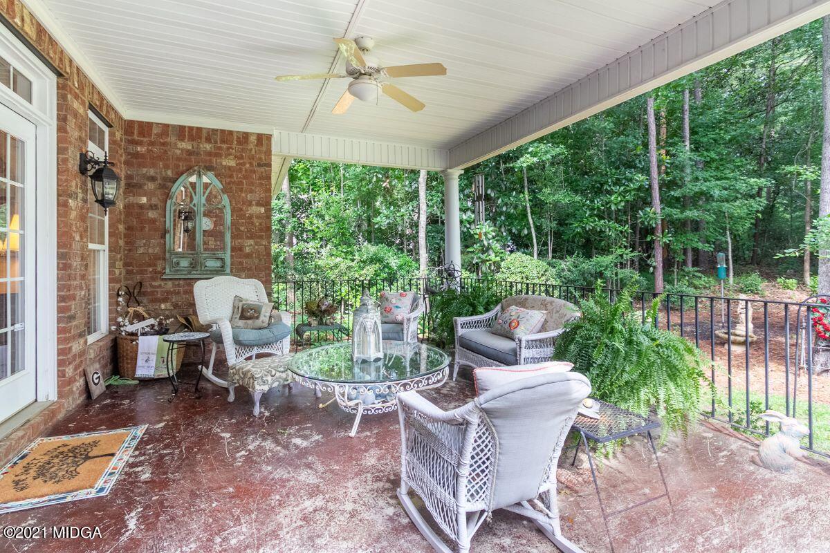 7109 Colaparchee Road Macon, GA 31220 - Photo 33 of 34 a view of a patio filled with furniture