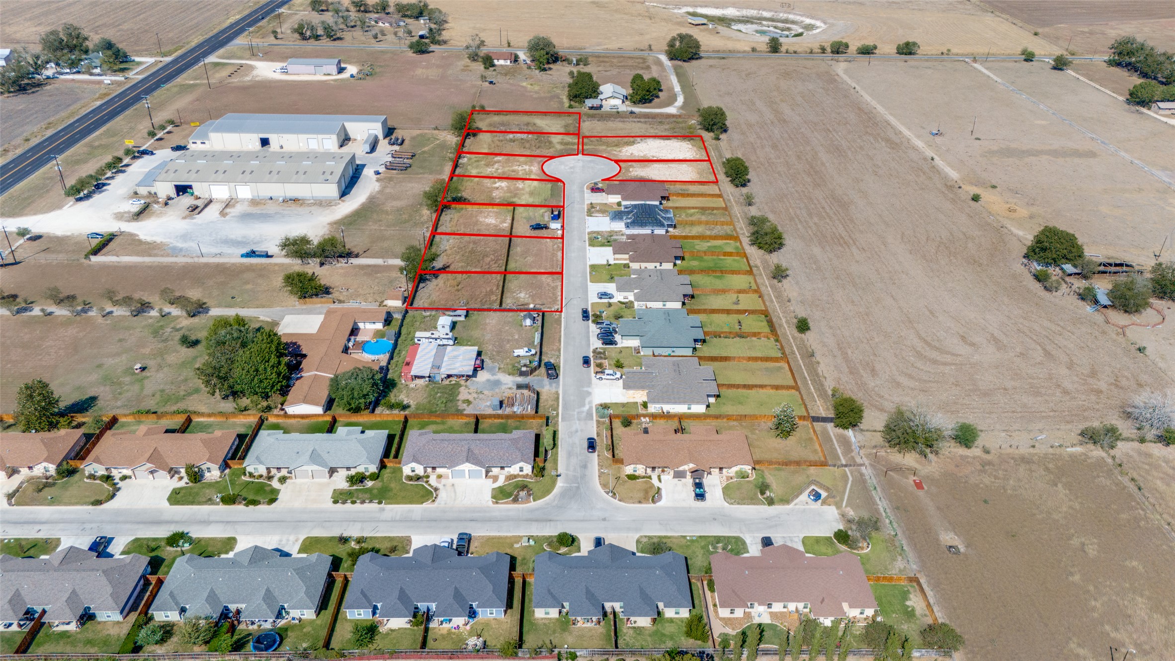 341 Navarro Way, Unit 25B Seguin, TX 78155 - Photo 2 of 7 an aerial view of residential houses with outdoor space