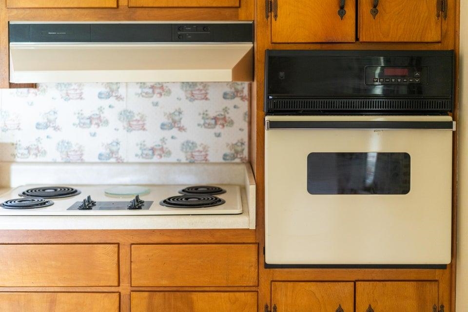 48 Round Hill School Road Fort Defiance, VA 24437 - Photo 15 of 37 a kitchen with a stove and a microwave