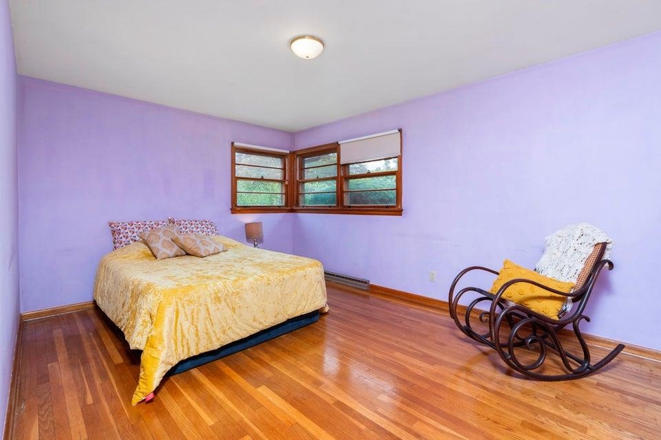 48 Round Hill School Road Fort Defiance, VA 24437 - Photo 20 of 37 a bed room with a bed and wooden floor