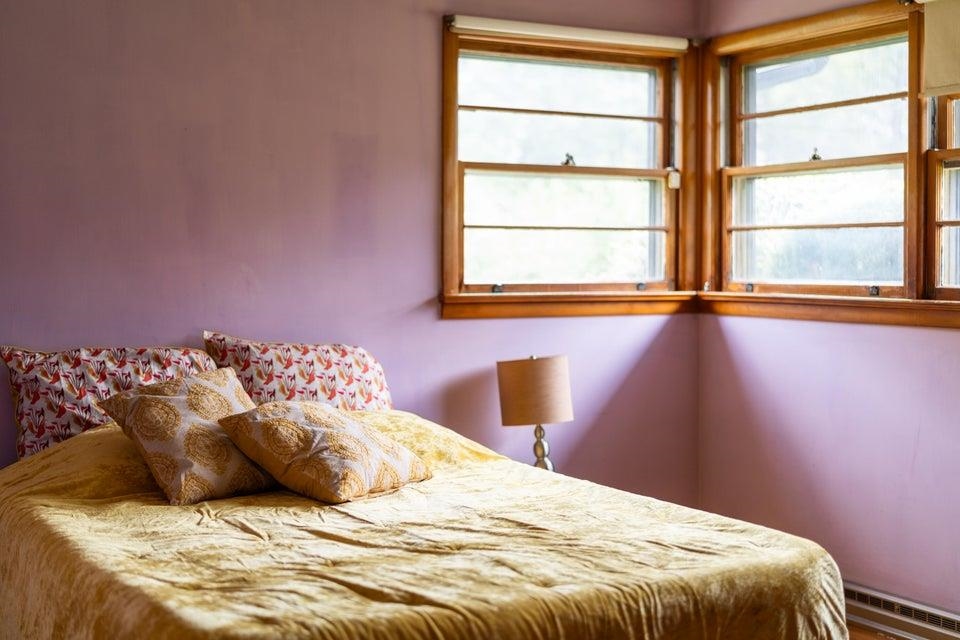 48 Round Hill School Road Fort Defiance, VA 24437 - Photo 22 of 37 a large bed sitting in a bedroom next to a window