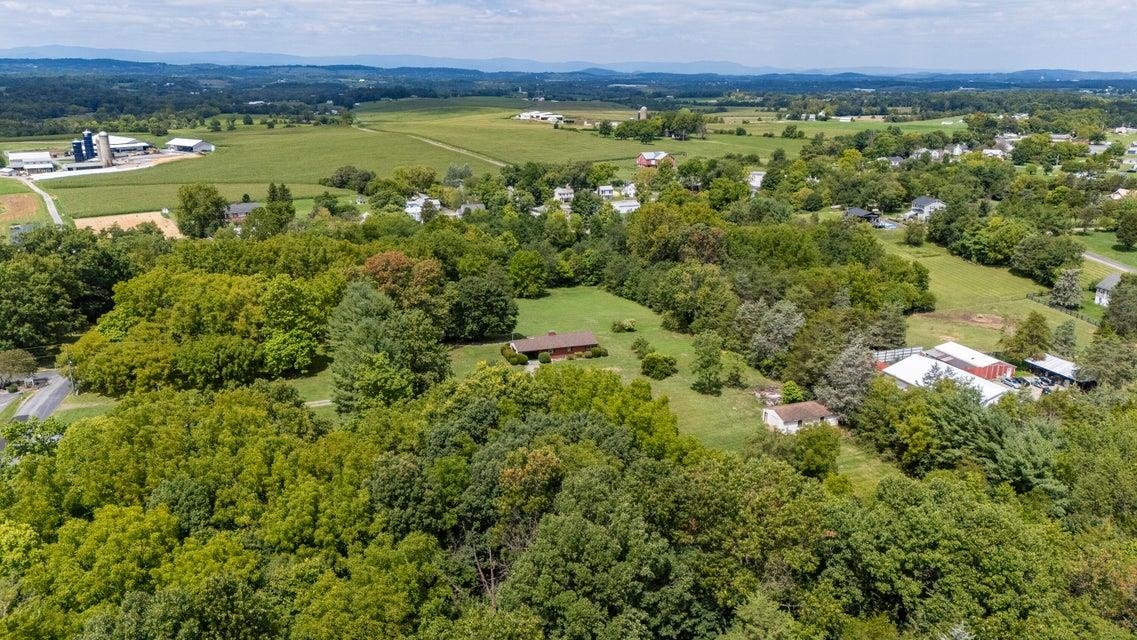 48 Round Hill School Road Fort Defiance, VA 24437 - Photo 29 of 37 a view of a lush green field with lots of plants in it