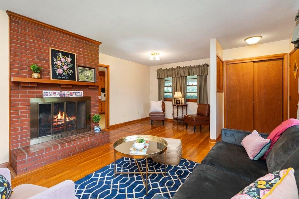 48 Round Hill School Road Fort Defiance, VA 24437 - Photo 5 of 37 a living room with furniture and a fireplace