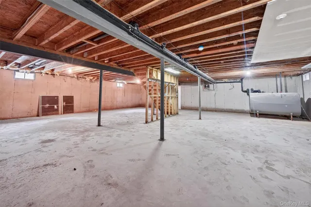 a area with cabinets and wooden floor