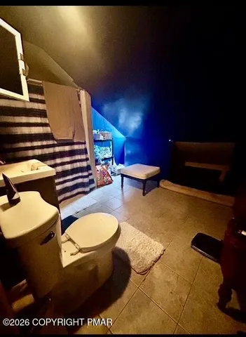 a bathroom with a toilet