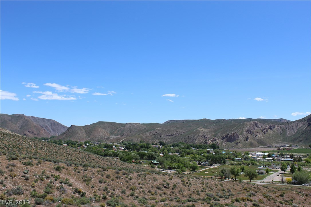 77 Acres Caliente, NV 89008 - Photo 3 of 11 Viewing Northeast over the hillside and the city of Caliente.