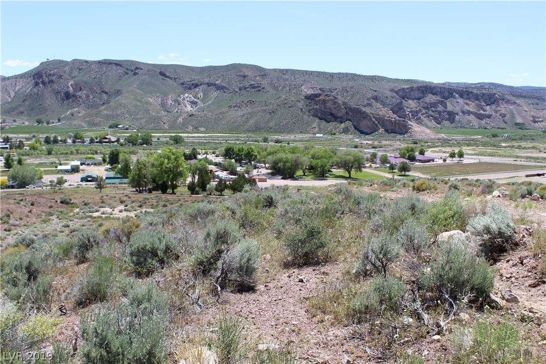 77 Acres Caliente, NV 89008 - Photo 8 of 11 Viewing East over the hillsides and the City of Caliente.