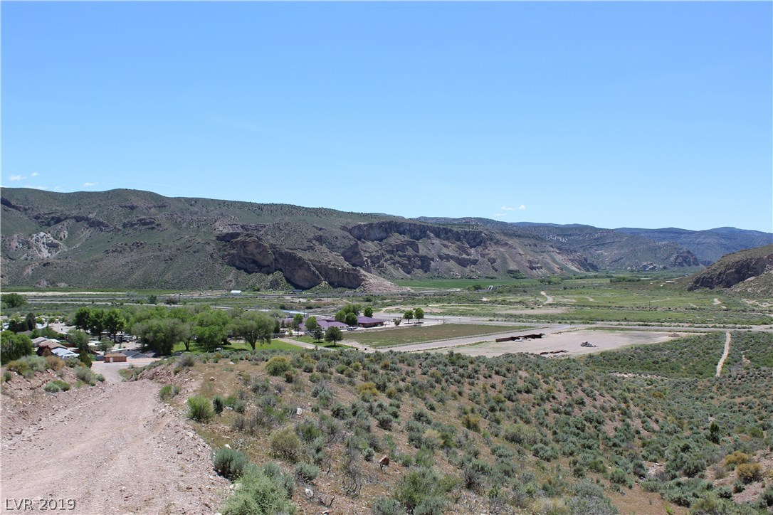 77 Acres Caliente, NV 89008 - Photo 10 of 11 Viewing East on road up to the city water tank that serves this property.