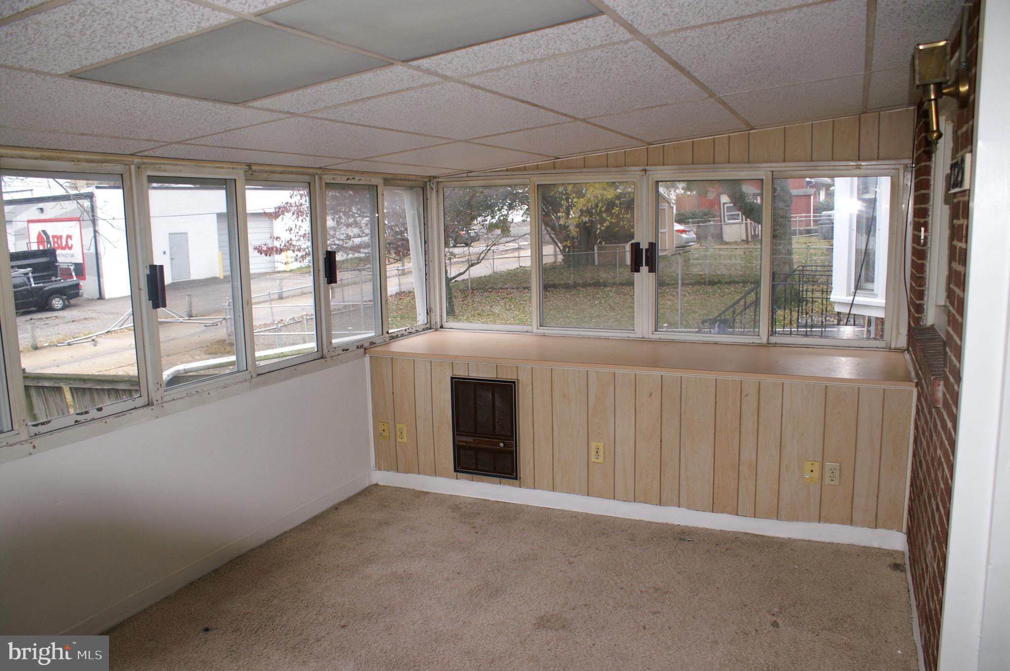 7329 Stratton Way Baltimore, MD 21224 - Photo 8 of 22 Four Season Room into