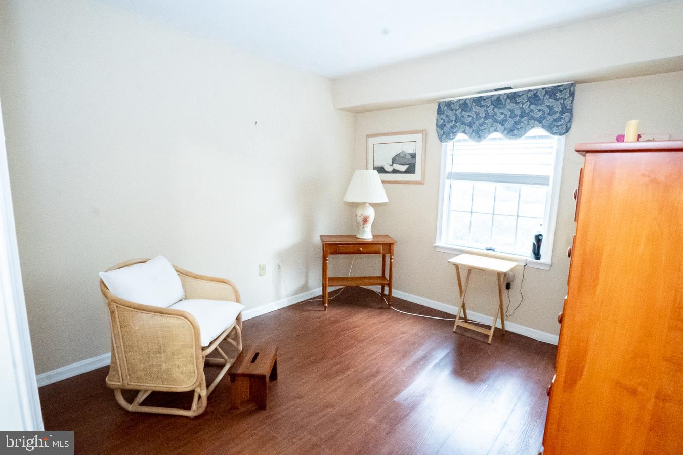 620 Manatawny Street, Unit CONDO 25 Pottstown, PA 19464 - Photo 18 of 28 a living room with furniture and a window