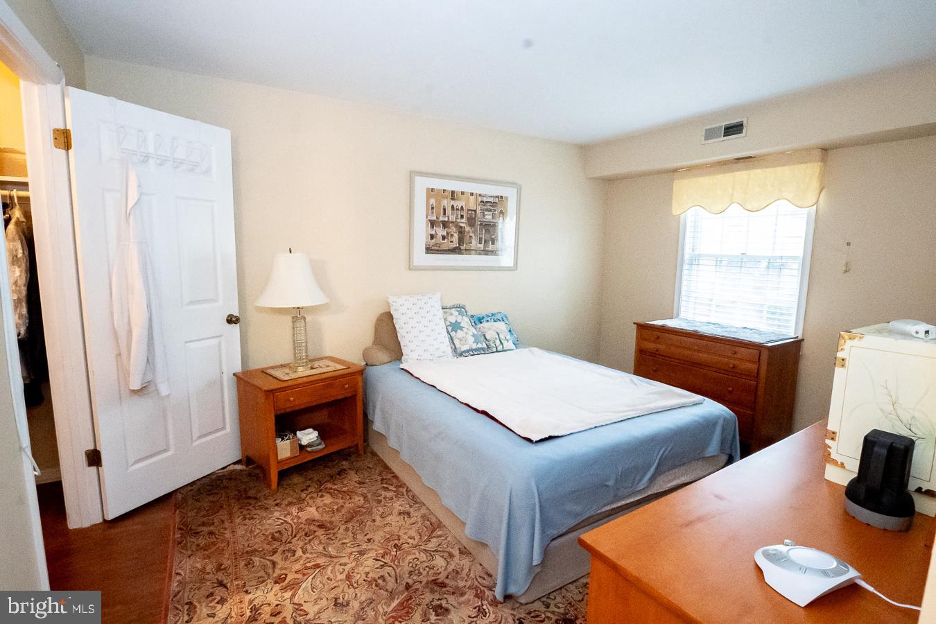 620 Manatawny Street, Unit CONDO 25 Pottstown, PA 19464 - Photo 21 of 28 a bedroom with 2 bed and a window