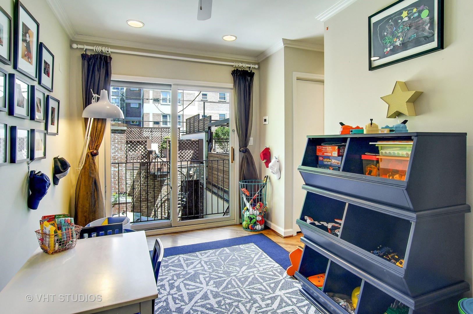 2017 North Sedgwick Street Chicago, IL 60614 - Photo 15 of 30 a living room with furniture a flat screen tv and a window