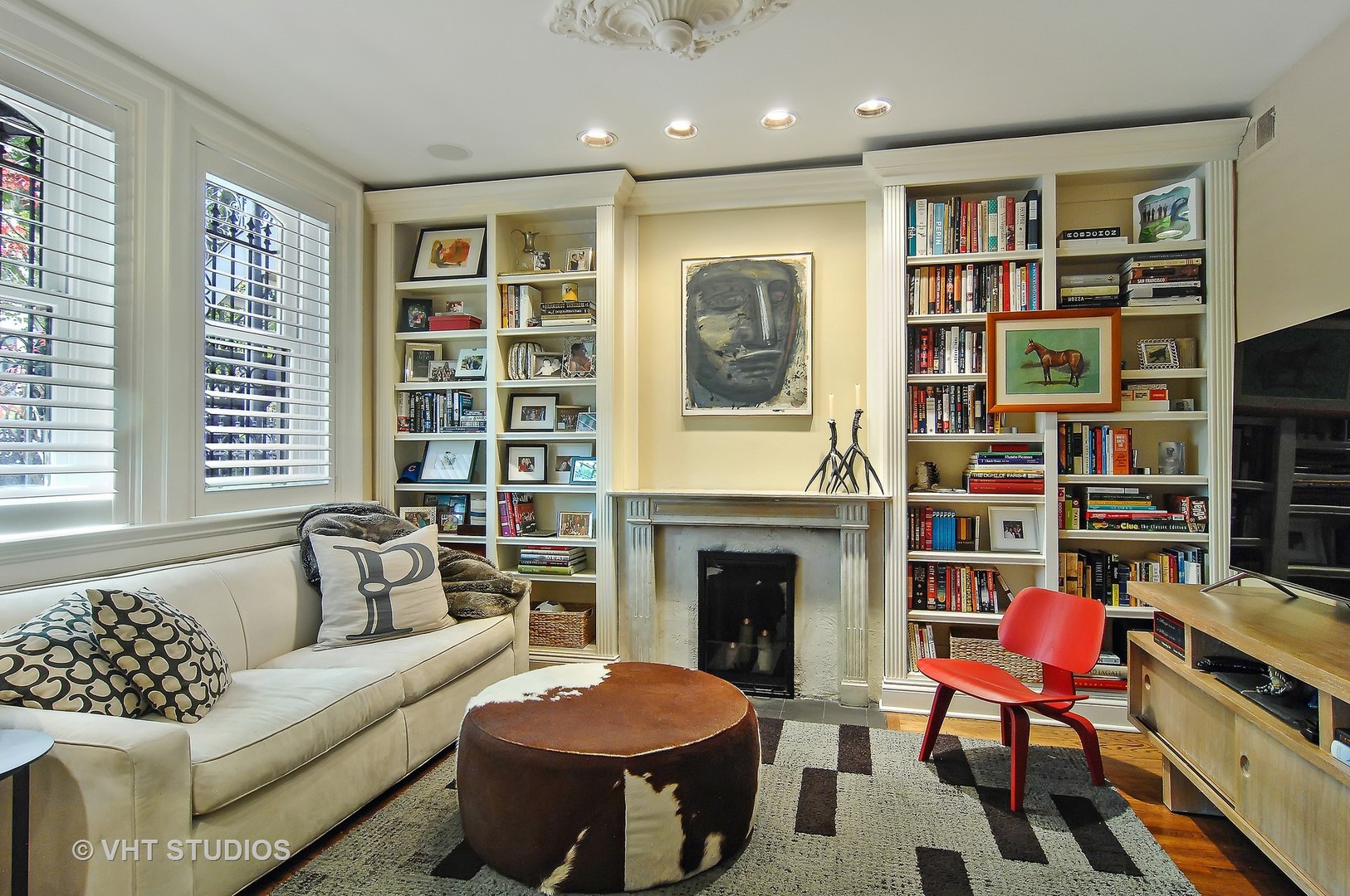 2017 North Sedgwick Street Chicago, IL 60614 - Photo 18 of 30 a living room with furniture a rug and a fireplace
