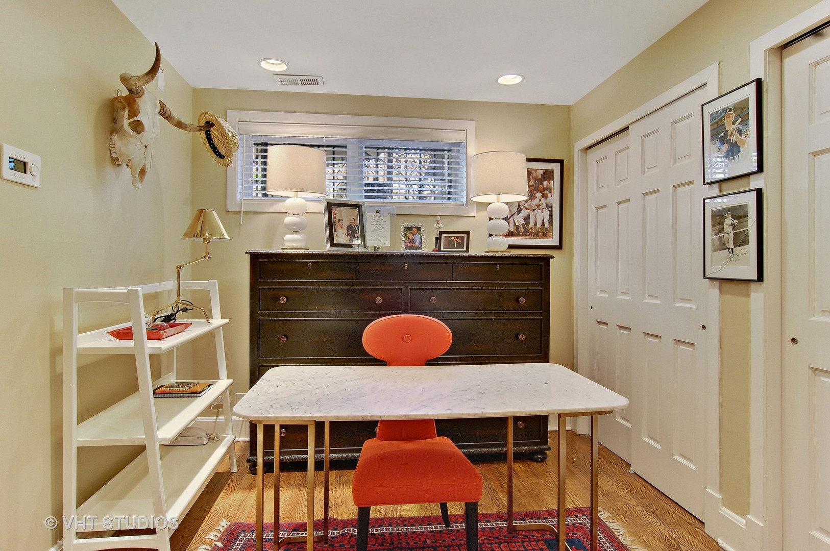 2017 North Sedgwick Street Chicago, IL 60614 - Photo 21 of 30 a dining room with stainless steel appliances kitchen island granite countertop wooden cabinets and table