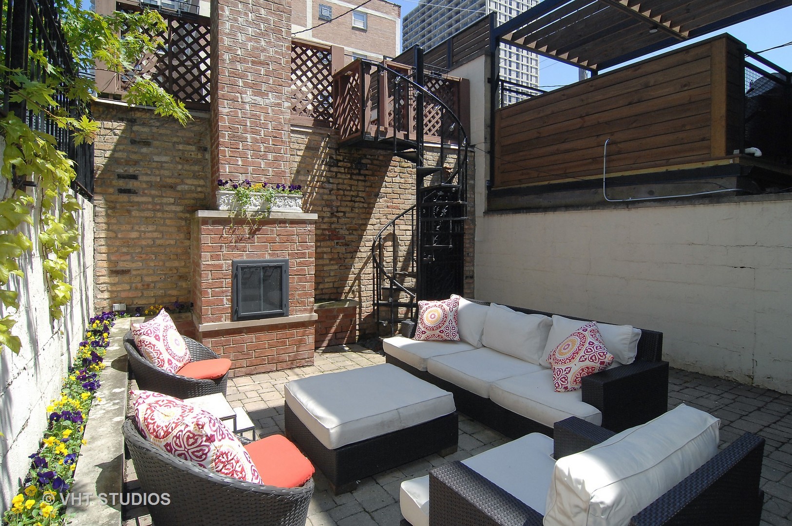 2017 North Sedgwick Street Chicago, IL 60614 - Photo 28 of 30 a view of a patio with couches table and chairs and potted plants