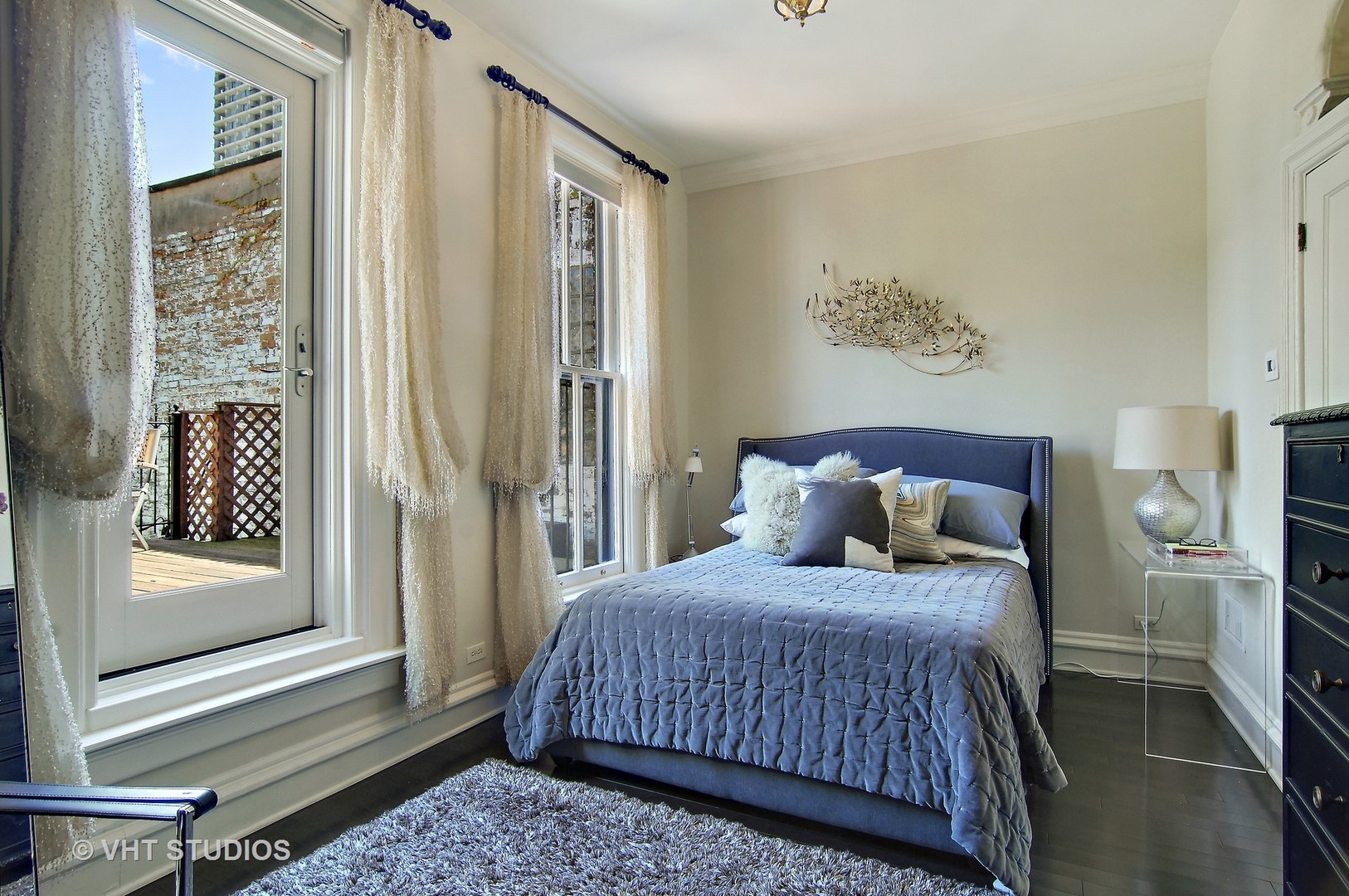 2017 North Sedgwick Street Chicago, IL 60614 - Photo 9 of 30 a bedroom with a bed and a window