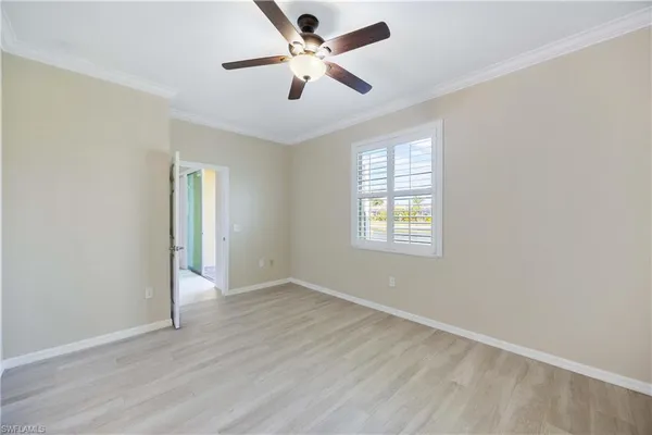 a bathroom with a double vanity sink mirror and shower