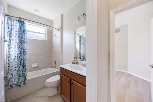 a view of a bathroom from a hallway