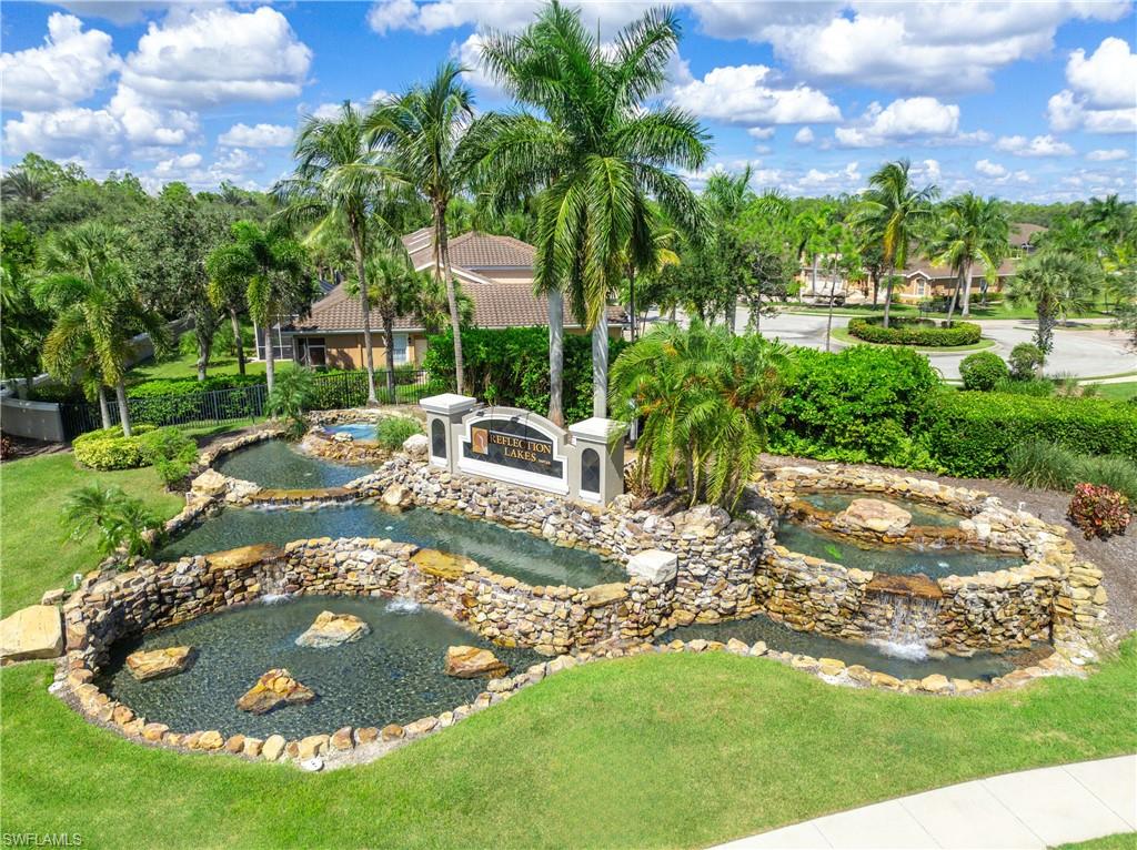 14488 Grapevine Drive Naples, FL 34114 - Photo 35 of 36 a view of a water fountain in front of a house
