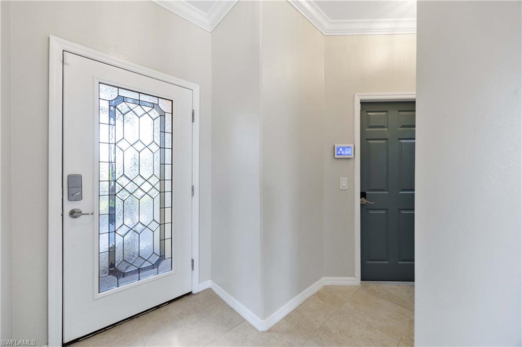14488 Grapevine Drive Naples, FL 34114 - Photo 5 of 36 a view of front door