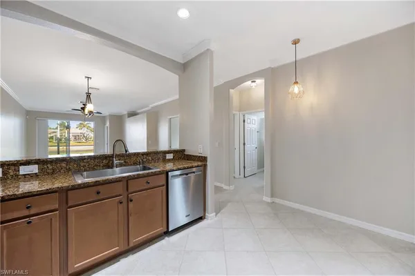 a large bathroom with a sink and a large mirror
