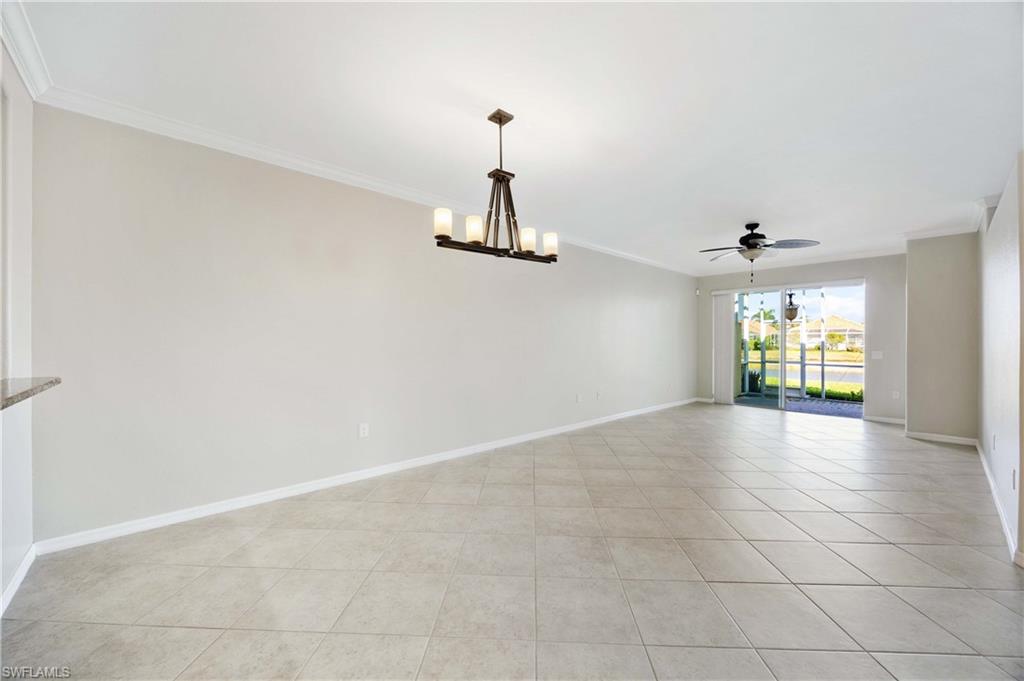 14488 Grapevine Drive Naples, FL 34114 - Photo 10 of 36 a view of an empty room with a window