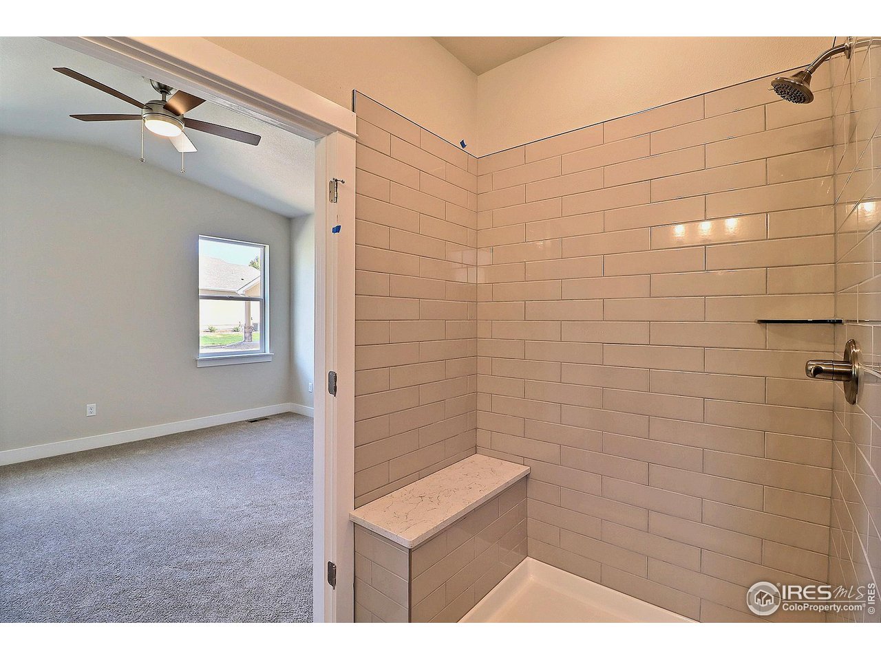 1250 Swainson Road Eaton, CO 80615 - Photo 24 of 35 Large shower with bench