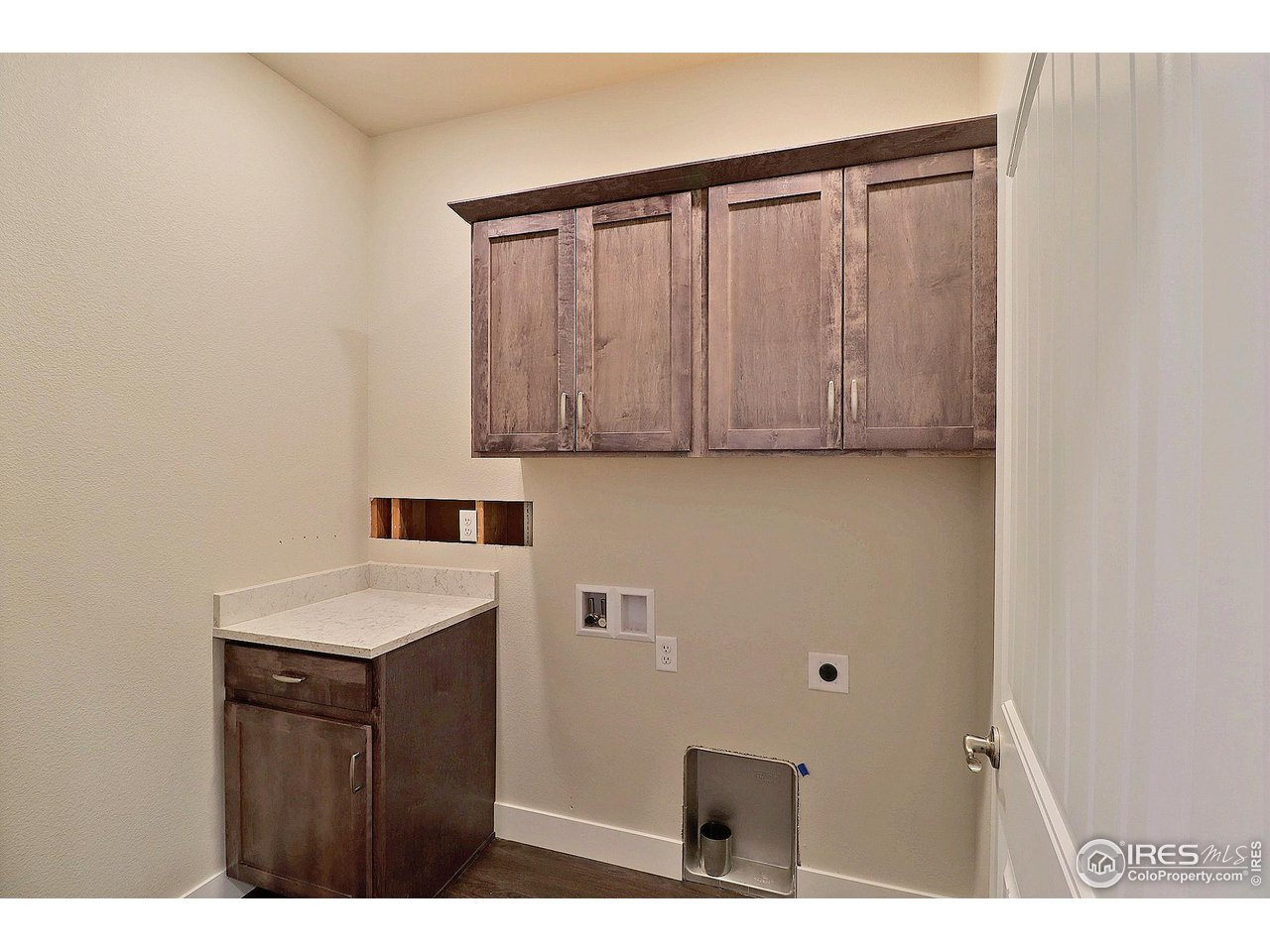 1250 Swainson Road Eaton, CO 80615 - Photo 31 of 35 Cabinets in laundry room