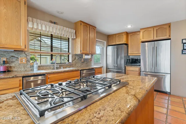 a spacious bathroom with a bathtub and shower