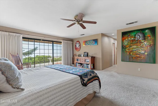 a bed room with a bed and a window