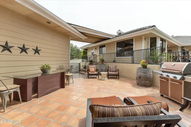 a kitchen with cabinets and a refrigerator