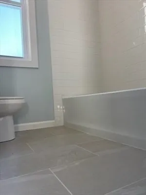 a view of a small space with a sink and a toilet