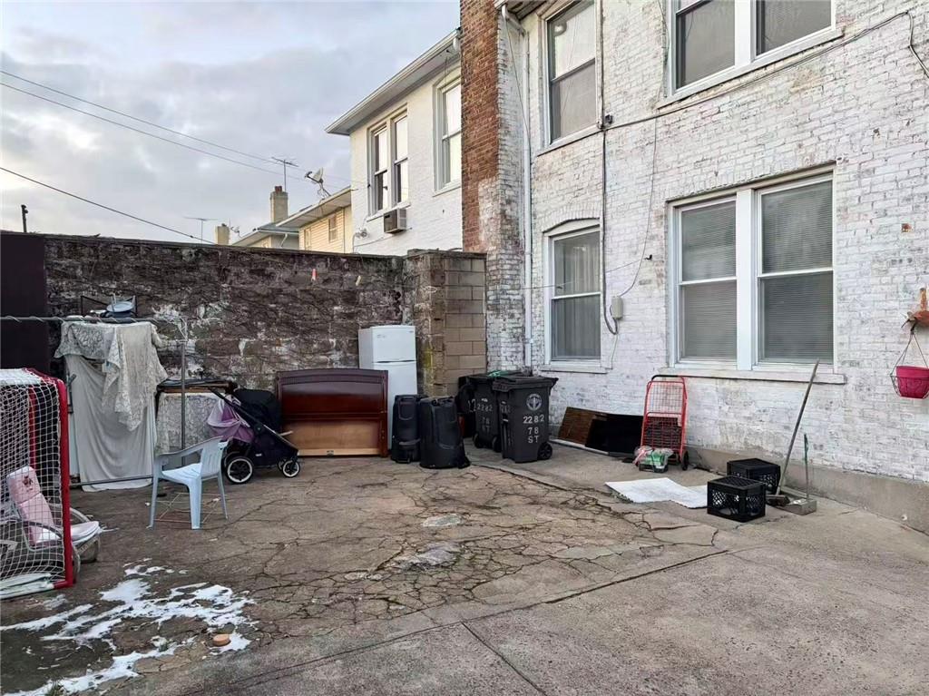 2276 78th Street Brooklyn, NY 11214 - Photo 16 of 16 a view of a patio with table and chairs