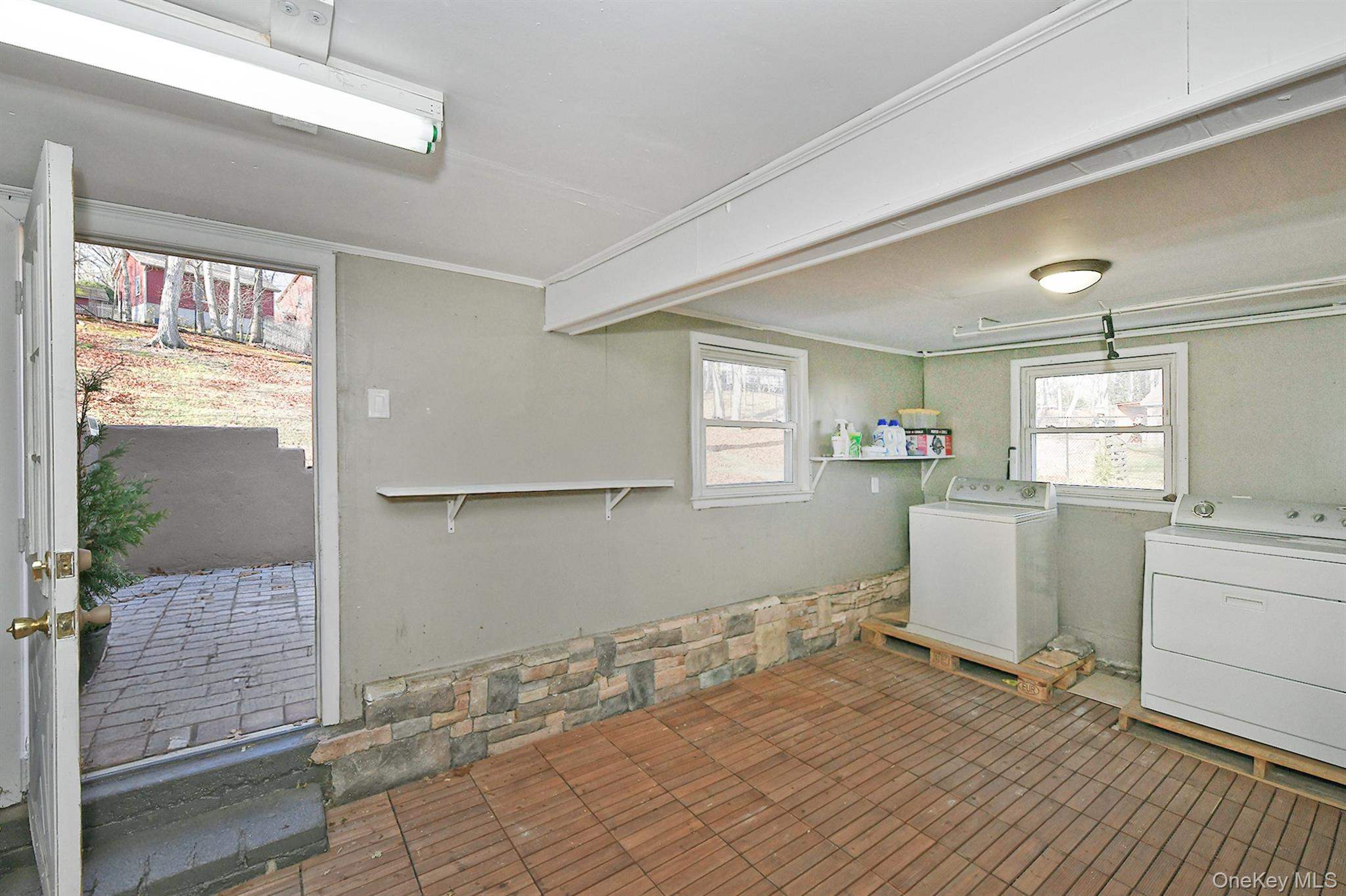 150 Hallock Landing Road Rocky Point, NY 11778 - Photo 26 of 36 Laundry room with ornamental molding and separate washer and dryer