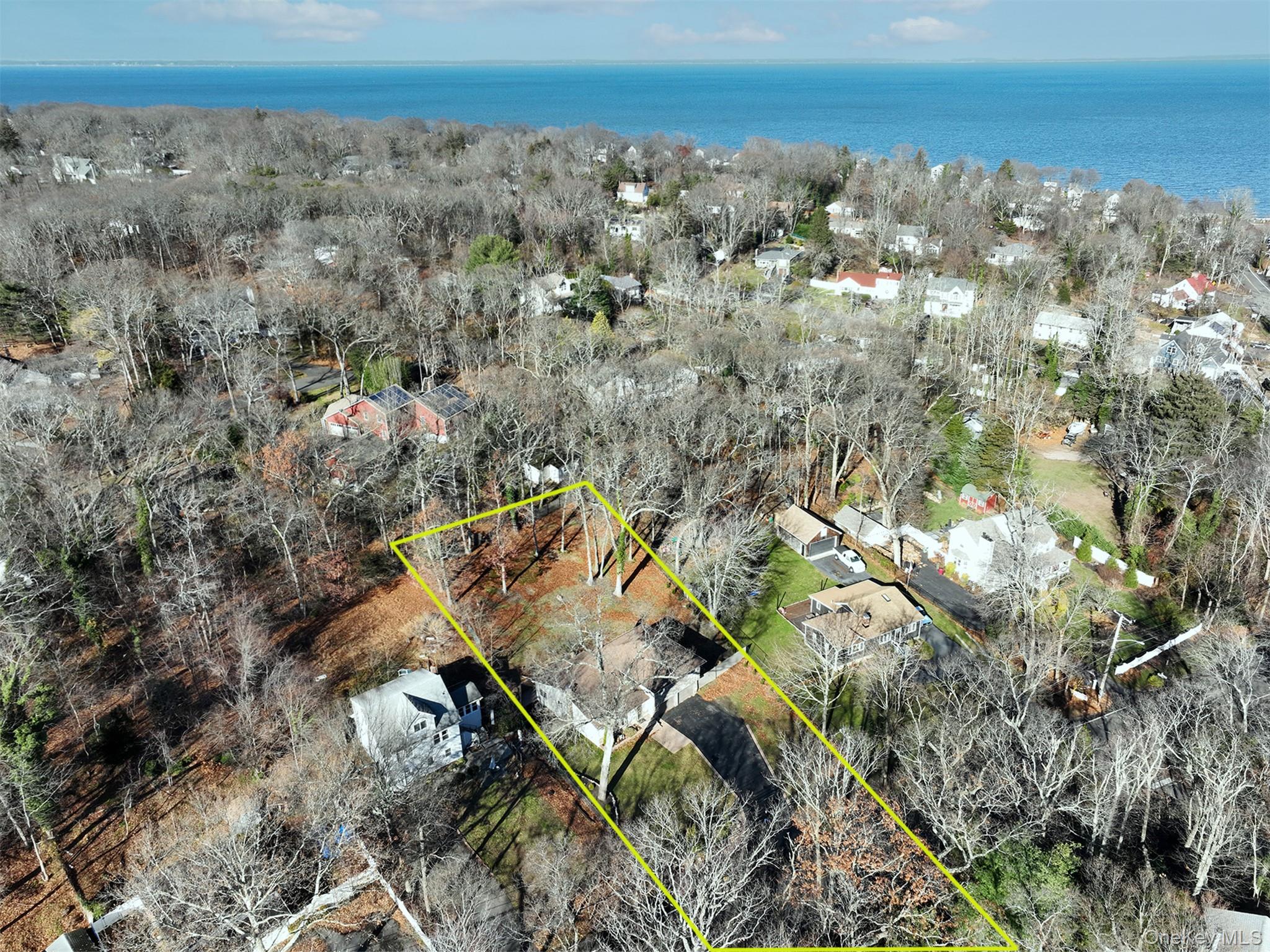 150 Hallock Landing Road Rocky Point, NY 11778 - Photo 31 of 36 Aerial overview of property's location with property parcel outlined and a large body of water