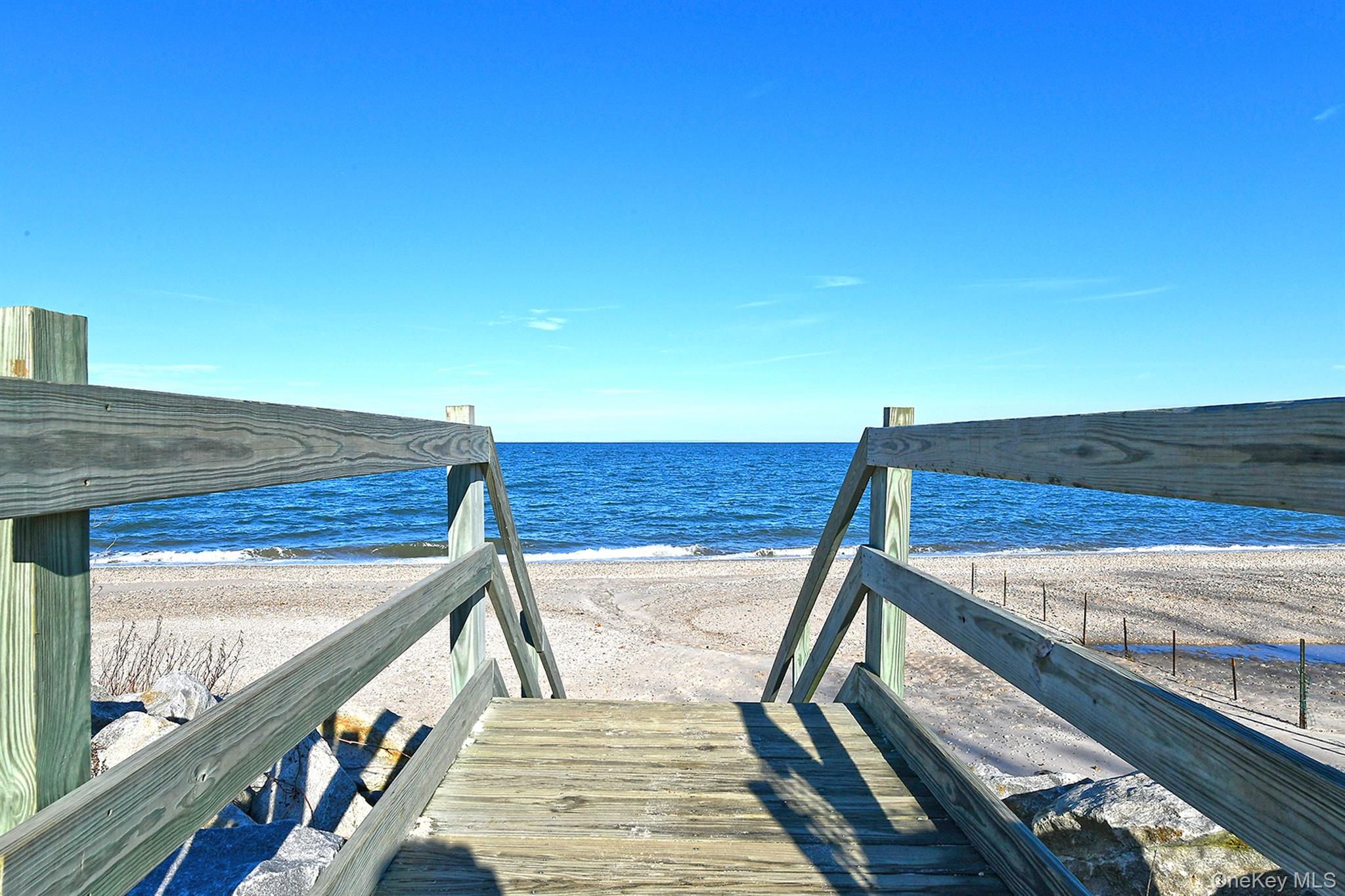 150 Hallock Landing Road Rocky Point, NY 11778 - Photo 33 of 36 Surrounding community with view of water and beach