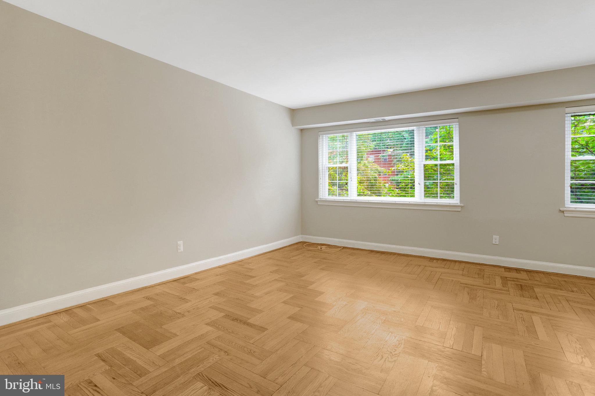 1307 North Ode Street, Unit 424 Arlington, VA 22209 - Photo 3 of 14 an empty room with a window