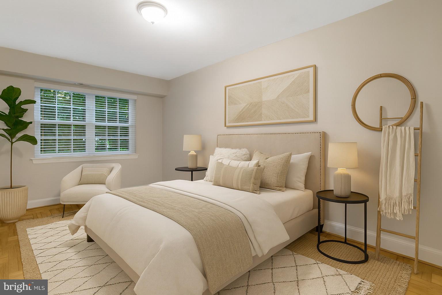 1307 North Ode Street, Unit 424 Arlington, VA 22209 - Photo 9 of 14 a bedroom with bed and a window