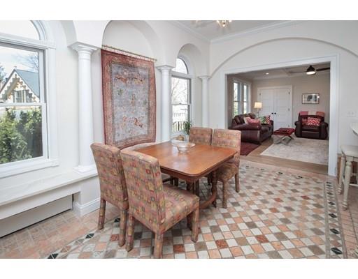 929 Beacon Street Newton, MA 02459 - Photo 11 of 36 a view of a dining room with furniture and wooden floor