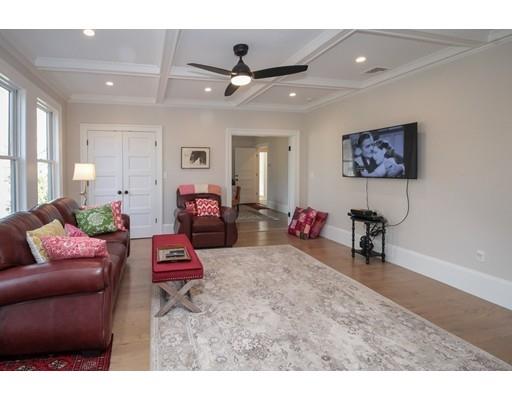929 Beacon Street Newton, MA 02459 - Photo 12 of 36 a living room with furniture and a chandelier