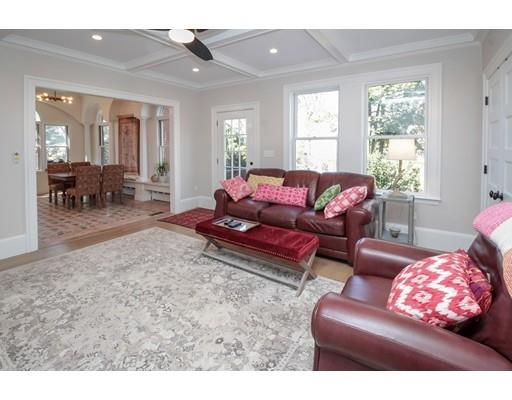 929 Beacon Street Newton, MA 02459 - Photo 14 of 36 a living room with furniture and a large window
