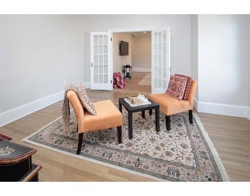 929 Beacon Street Newton, MA 02459 - Photo 16 of 36 a living room with furniture and wooden floor