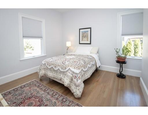 929 Beacon Street Newton, MA 02459 - Photo 17 of 36 a bedroom with bed and a window