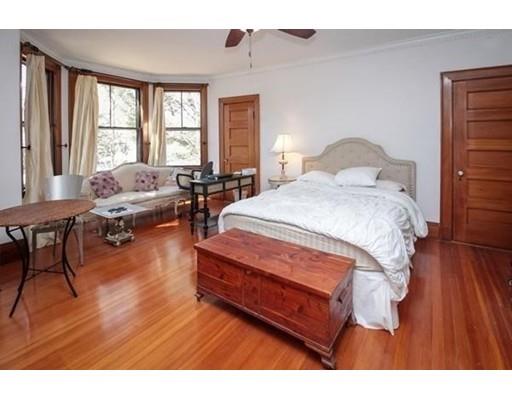 929 Beacon Street Newton, MA 02459 - Photo 28 of 36 a living room with furniture and a large window